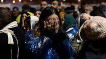 People gather to mark the two-year anniversary of the country's catastrophic earthquake
