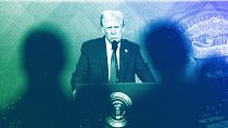 People follow a virtual speech of US President Donald Trump at the Annual Meeting of World Economic Forum in Davos, 23 January 2025