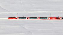 The Glacier Express on its way through Goms, Switzerland. 