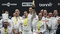 French chef Paul Marcon, center, celebrates with his teammates after winning the final of the "Bocuse d'Or" (Golden Bocuse) trophy, in Lyon, Monday, Jan. 27, 2025