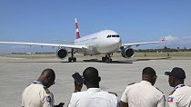 A plane transporting police officers from El Salvador, part of a UN-backed multinational force, lands at Toussaint Louverture Airport in Port-au-Prince, Haiti, Feb. 4, 2025.