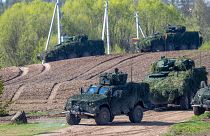 Lithuanian Army soldiers take part in a Lithuanian-Polish Brave Griffin 24/II military exercise near the Suwalki Gap near the Polish border at the Dirmiskes village.