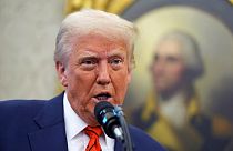 President Donald Trump speaks before Pam Bondi is sworn in as Attorney General by Supreme Court Associate Justice Clarence Thomas, in the Oval Office of the White House.