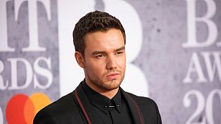 Liam Payne poses for photographers upon arrival at the Brit Awards in London, Wednesday, Feb. 20, 2019. 