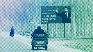 Chinese President Xi Jinping is seen on a billboard in Yarkent County in northwestern China's Xinjiang Uyghur Autonomous Region, March 2021