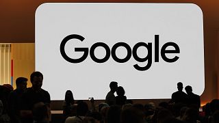File picture of audience members attending a new product announcement at Google's HQ in California 