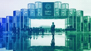 Attendees arrive for the day at the COP29 UN Climate Summit in Baku, November 2024