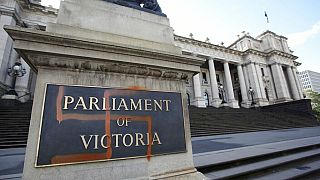FILE: A Nazi swastika is seen graffitied on the front of the Victorian State Parliament in Melbourne, Australia, Monday, Oct. 1, 2012. 