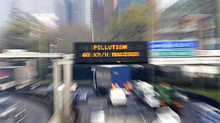 An electronic road sign on the Paris ring road reads "Pollution" Friday March 14, 2014.
