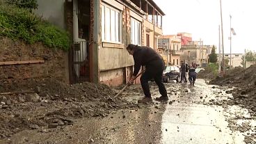 Residents of Zafferia in Sicily clean up the mud left by torrential rain, 04.02.2025
