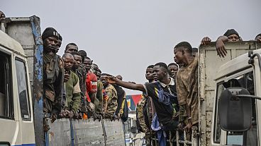 M23 rebels escort government soldiers and police who surrendered to an undisclosed location in Goma, Democratic republic of the Congo, Thursday, Jan. 30, 2025.
