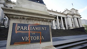 FILE: A Nazi swastika is seen graffitied on the front of the Victorian State Parliament in Melbourne, Australia, Monday, Oct. 1, 2012. 
