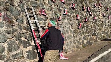 Ali İhsan Solak hangs a new boot on his wall in Güneysu, Turkey, 03.02.2025