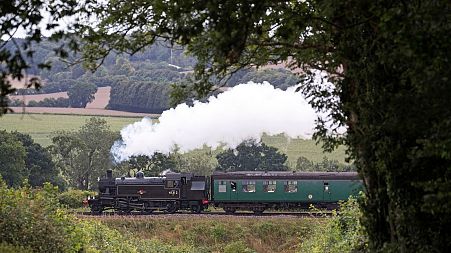 The British Railways Ivatt Class 2MT Tank Engine number 41312, makes its way along the Mid Hants railway, near to Ropley, England, August 2020. 