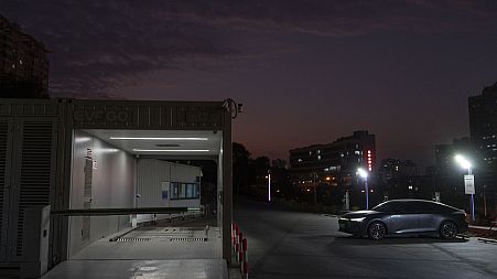 A first generation battery swapping station by China-based CATL battery manufacturing company, is seen in Xiamen, Fujian province, China, Wednesday, Dec. 18, 2024.