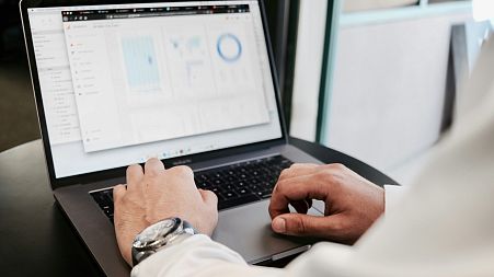 A computer programmer at work, one of the jobs that is likely to grow in demand