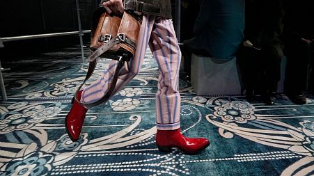 A model wears a creation part of the men's Prada Fall-Winter 2025-2026 collection, that was presented in Milan, Italy.