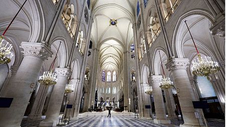 The nave of Notre-Dame de Paris cathedral is seen while French President Emmanuel Macron visits the restored interiors of the cathedral, Friday Nov. 29, 2024, in Paris