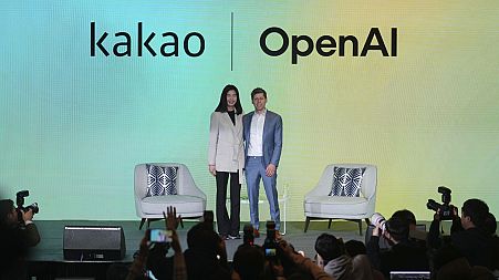 Open AI CEO Sam Altman, right, and Kakao CEO Shina Chung pose for the media at the Kakao media day in Seoul, South Korea, Tuesday, Feb. 4, 2025. 