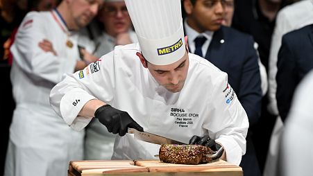 France's Bocuse d'Or winning chef Paul Marcon in action at the 2025 final