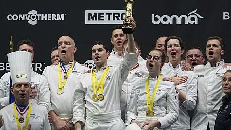French chef Paul Marcon, center, celebrates with his teammates after winning the final of the "Bocuse d'Or" (Golden Bocuse) trophy, in Lyon, Monday, Jan. 27, 2025