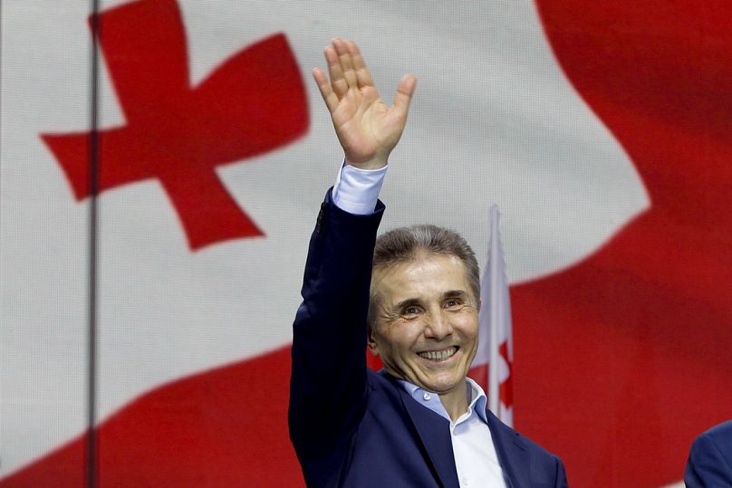 FILE: FILE - Billionaire Bidzina Ivanishvili, leader of the created by him the Georgian Dream party greets demonstrators during a rally in Tbilisi, Georgia, on April 29, 2024